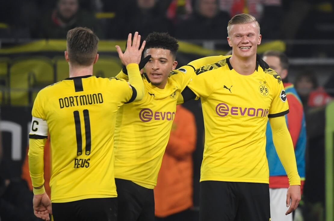 Marco Reus, Jaden Sancho und Erling Haaland jubeln